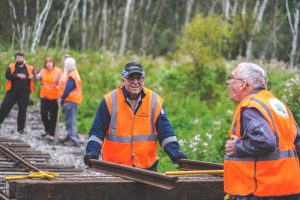 Volunteers laying track at Crowle Peatland Railway
