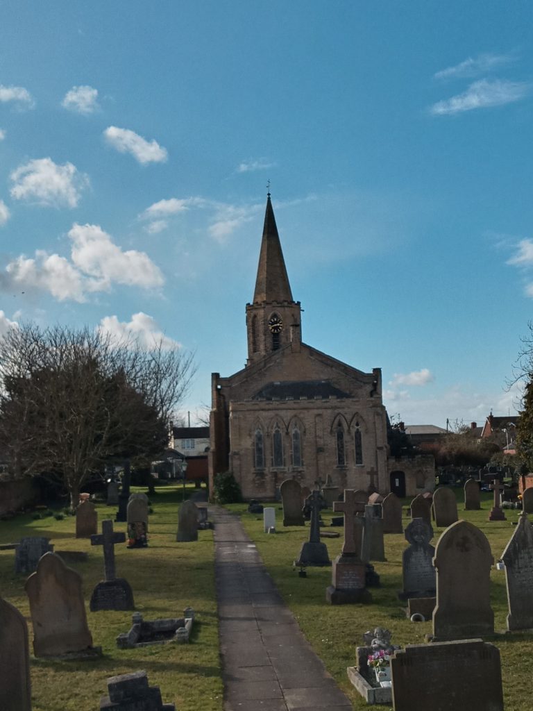 A view up the churchyard of West Butterwick Church